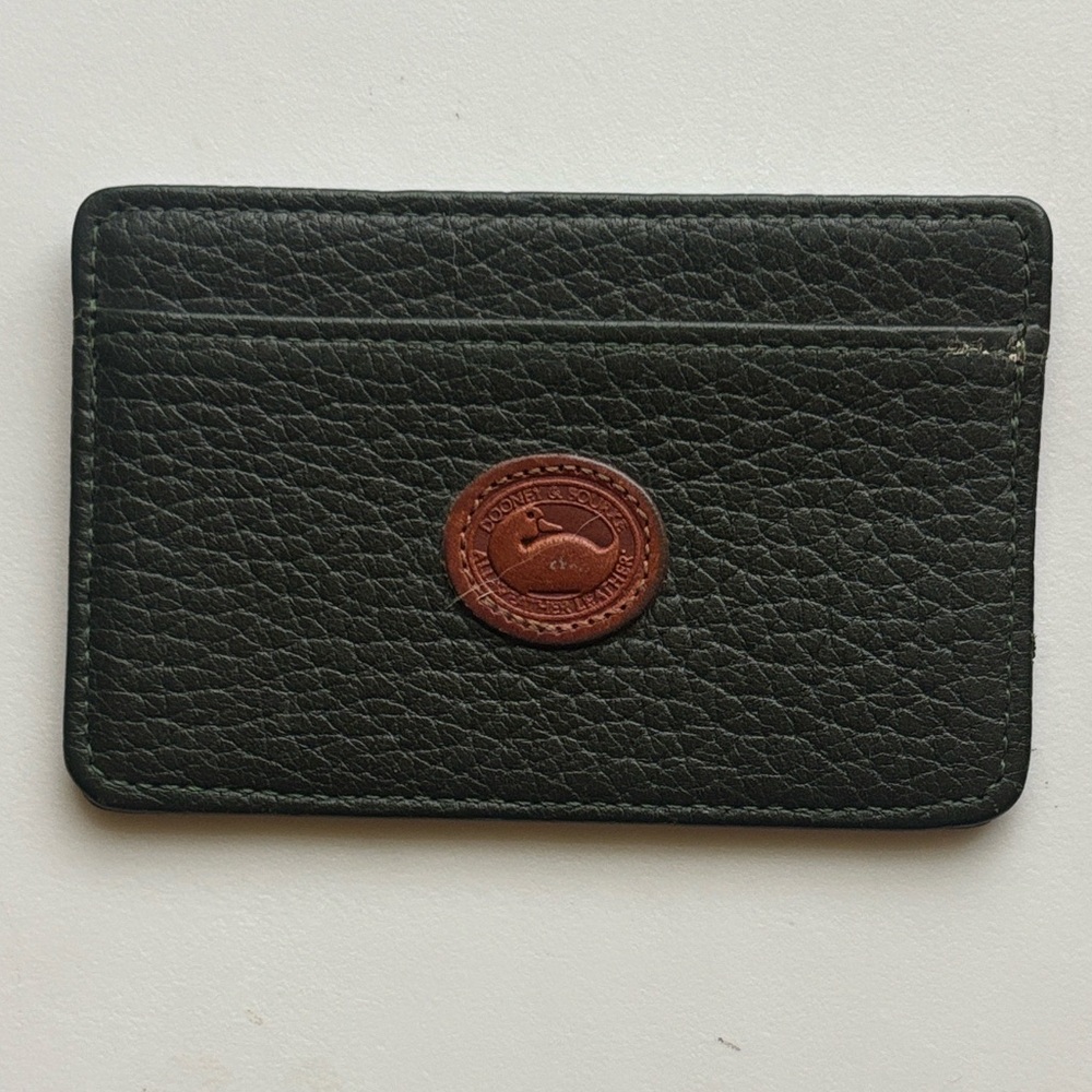 Dooney & Bourke Black Leather Card Sleeve with Brown Logo Patch